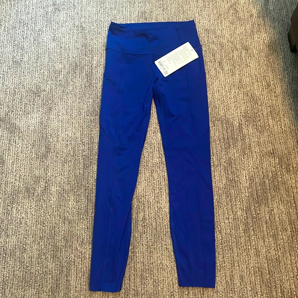 Never been worn blue leggings by lulu